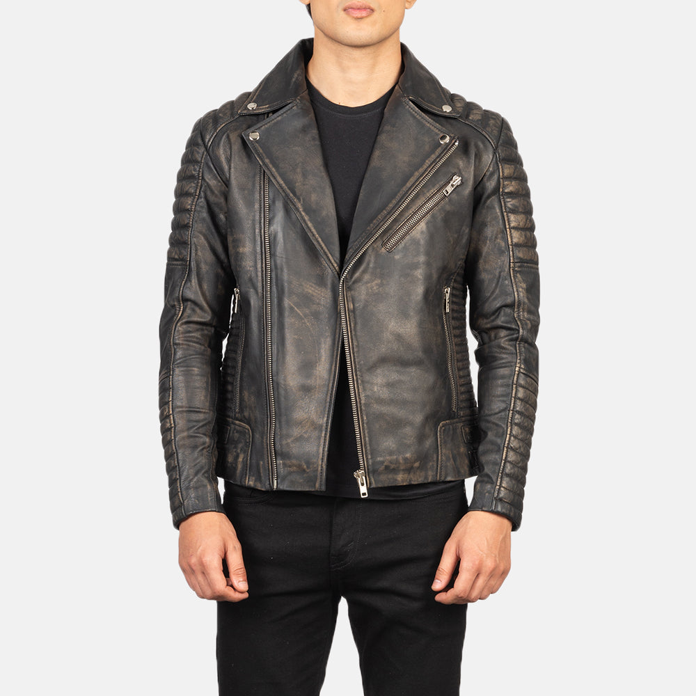 
Détail de confection artisanale de l'ourlet sur Armand Green Suede Biker Jacket