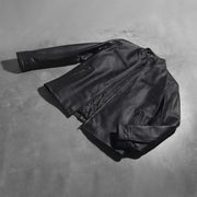 Button &amp; Hem Craftsmanship Construction Detail on Austere Matte Noir Veste Motard en Cuir pour Homme