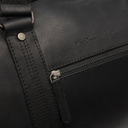 
Rivaro Sac week-end en cuir pleine fleur - Profil latéral structuré montrant la profondeur du soufflet